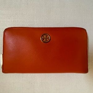 TORY BURCH orange wallet.
